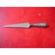 Antique letter opener with silver handle. It has the initials JMP engraved